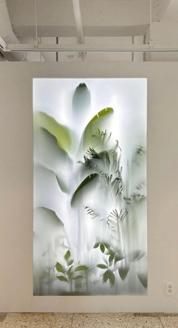 Pale leaves in a gallery frame